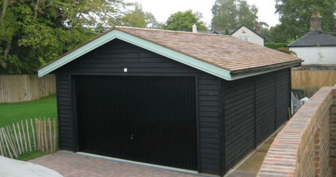 Garage roofers Worcester working on garage roof installation.