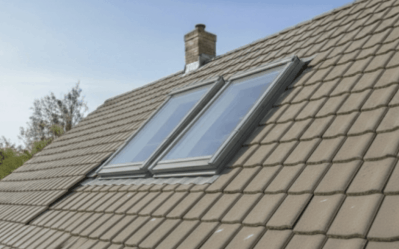 Velux windows installed on pitched roof.