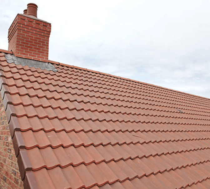 New roof specialists Birmingham working on roof installation.