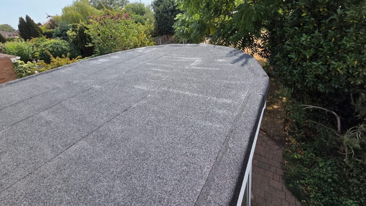 Flat roof maintenance for residential property.
